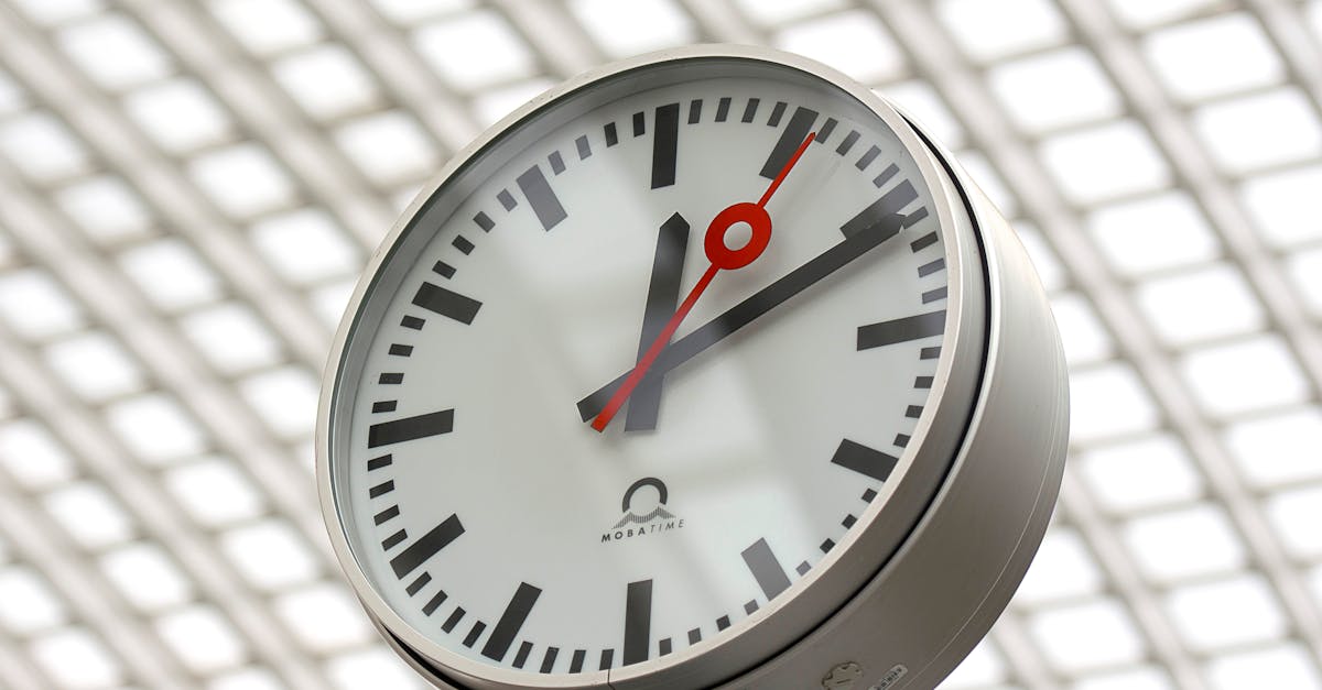 Two clocks showing different times in different countries