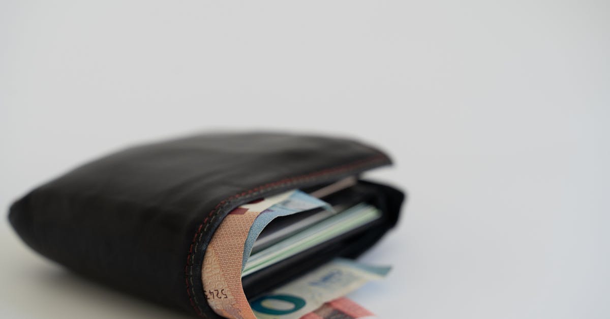 Umbrella protecting finances from economic storm clouds