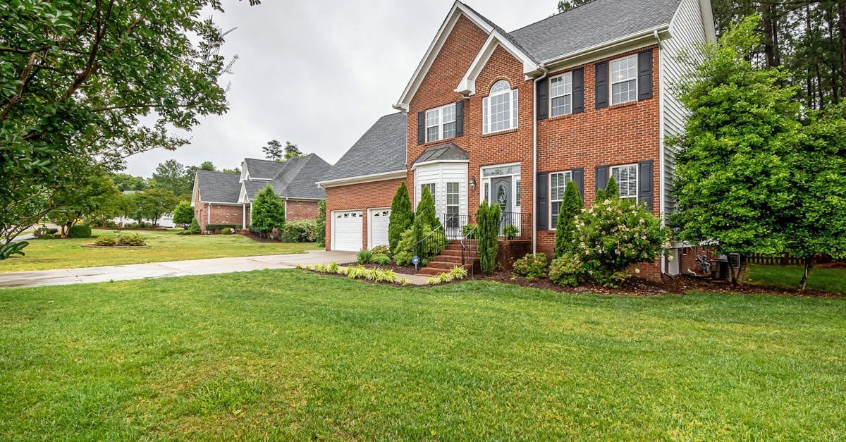 Two model houses side by side with different price tags